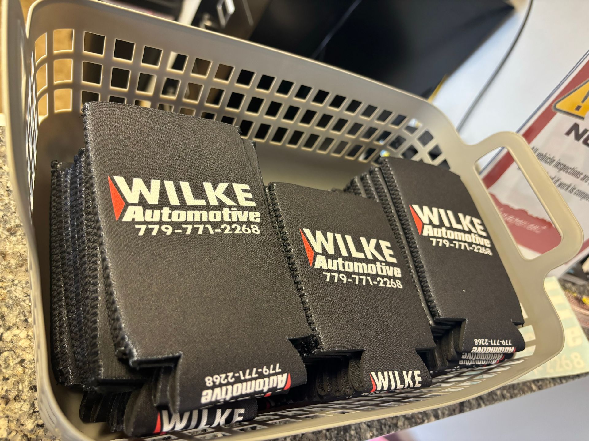 A basket filled with wilke automotive can coolers