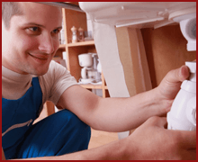 A happy plumber in action