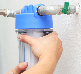 Holding a water heater for plumbing services