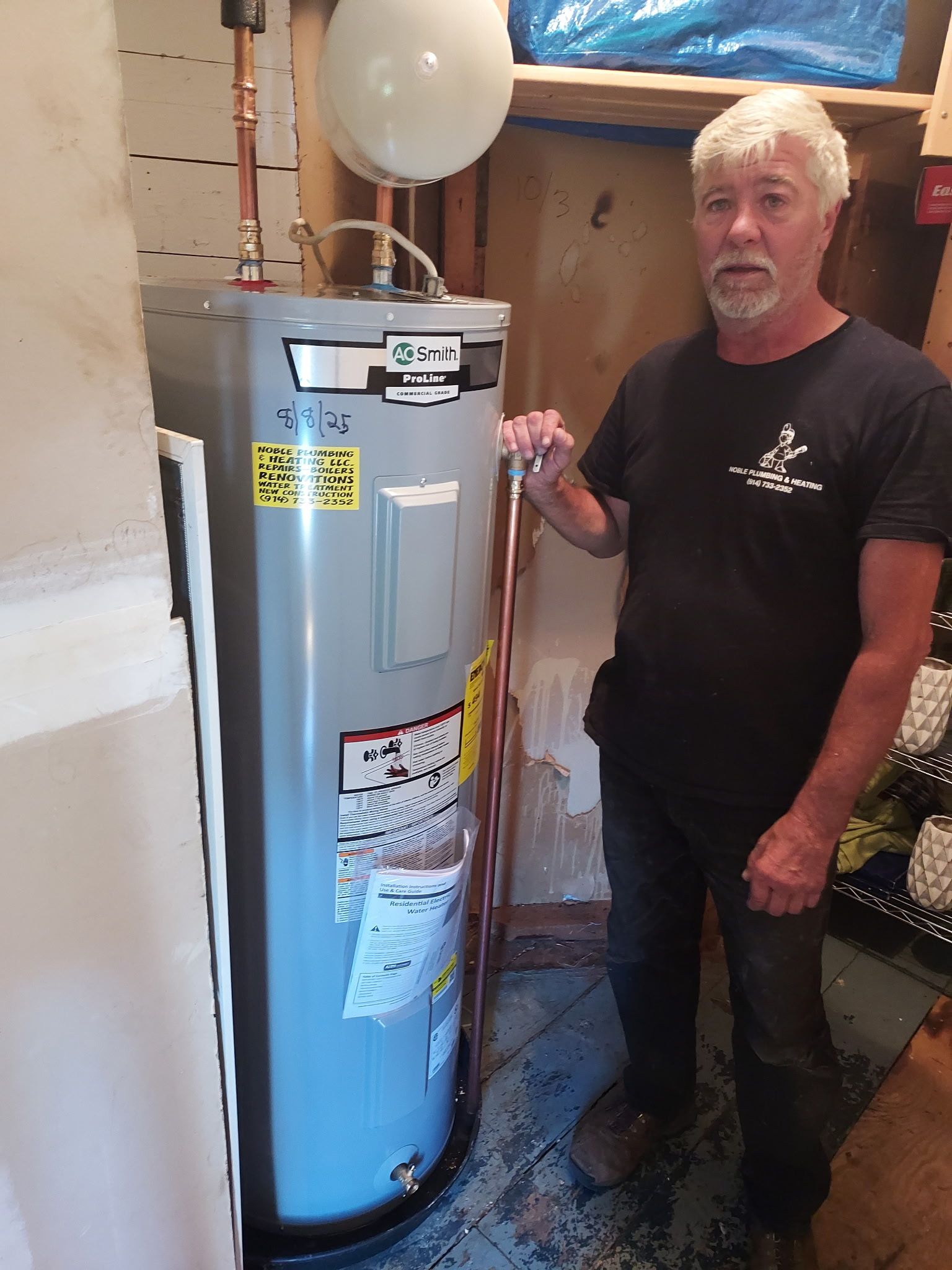 Man With Water Heater, Bedford, NY