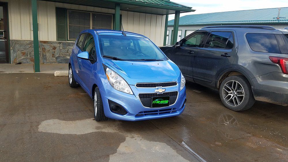 after image of repaired blue car