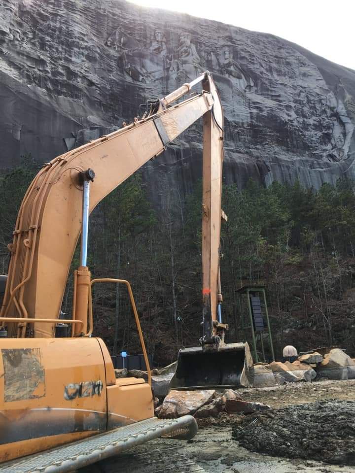 Yellow backhoe standby
