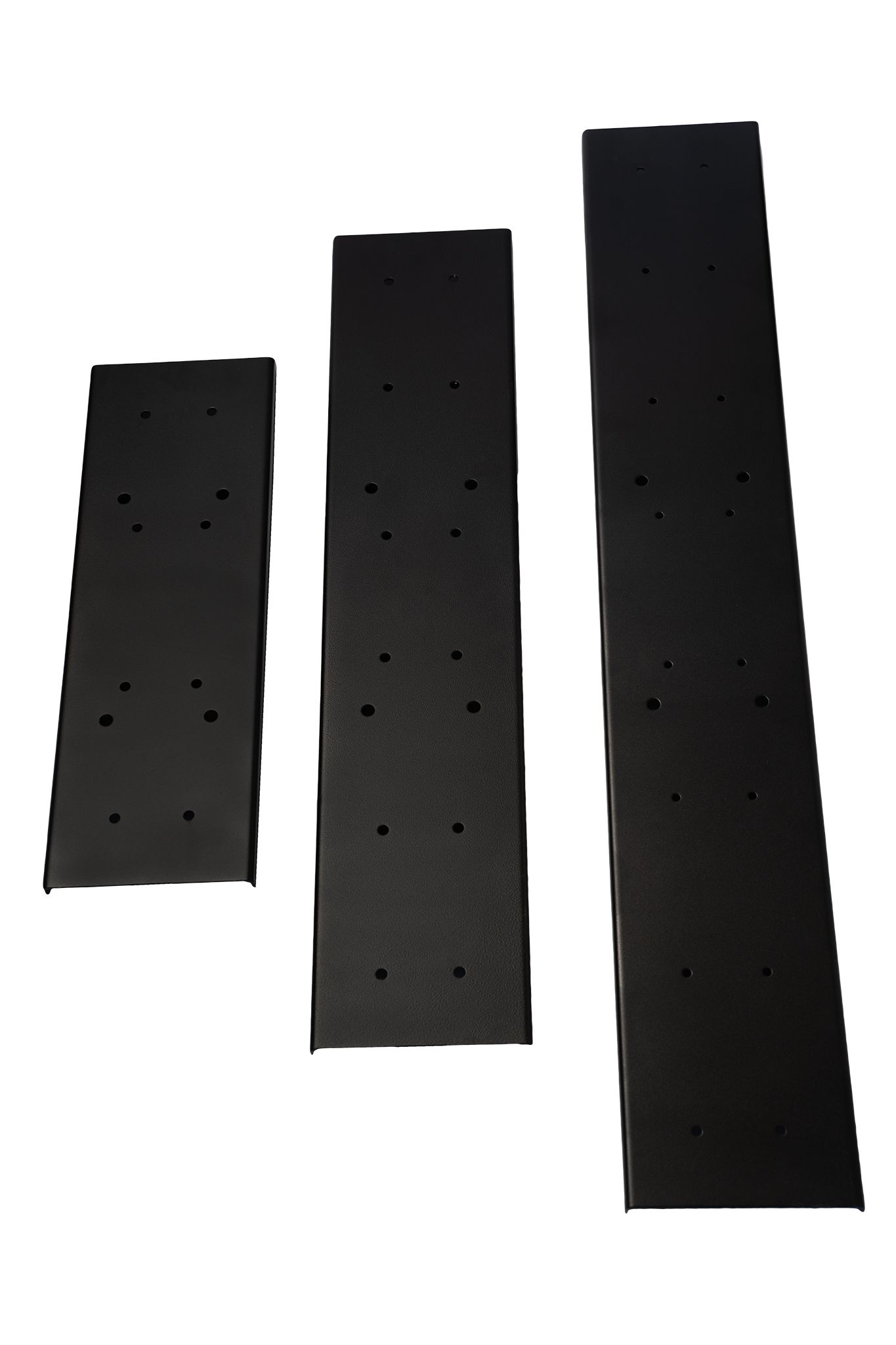 Three black perforated strips arranged vertically on a white background.