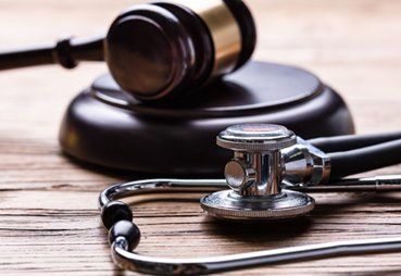 Mallet and stethoscope representing wrongful death
