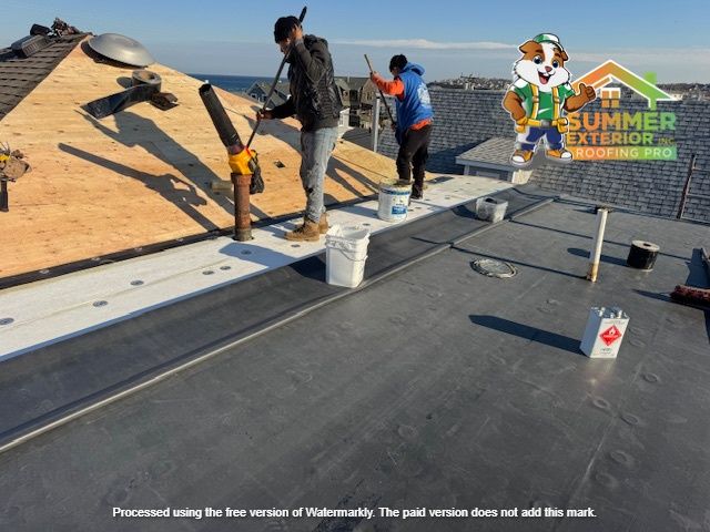 Two people on a roof applying sealant with brushes. Summer Exterior Roofing Pro logo is visible.