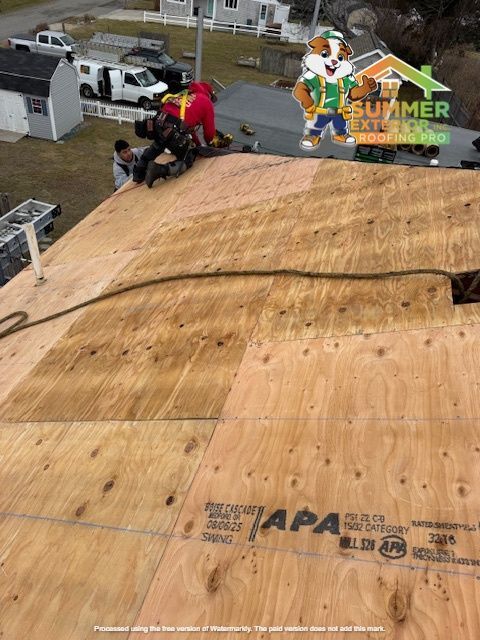 Roofers installing plywood on a sloped roof. Brown plywood, figures in red and black work.