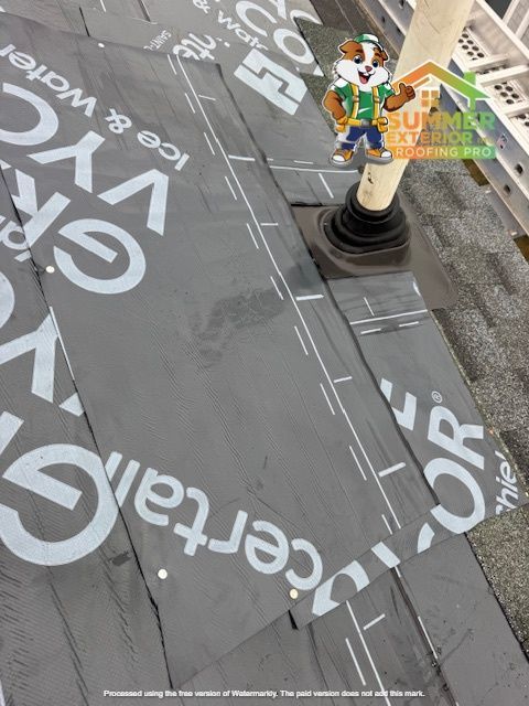 Roofing work in progress, showing a pipe flashing and ice & water shield installation.