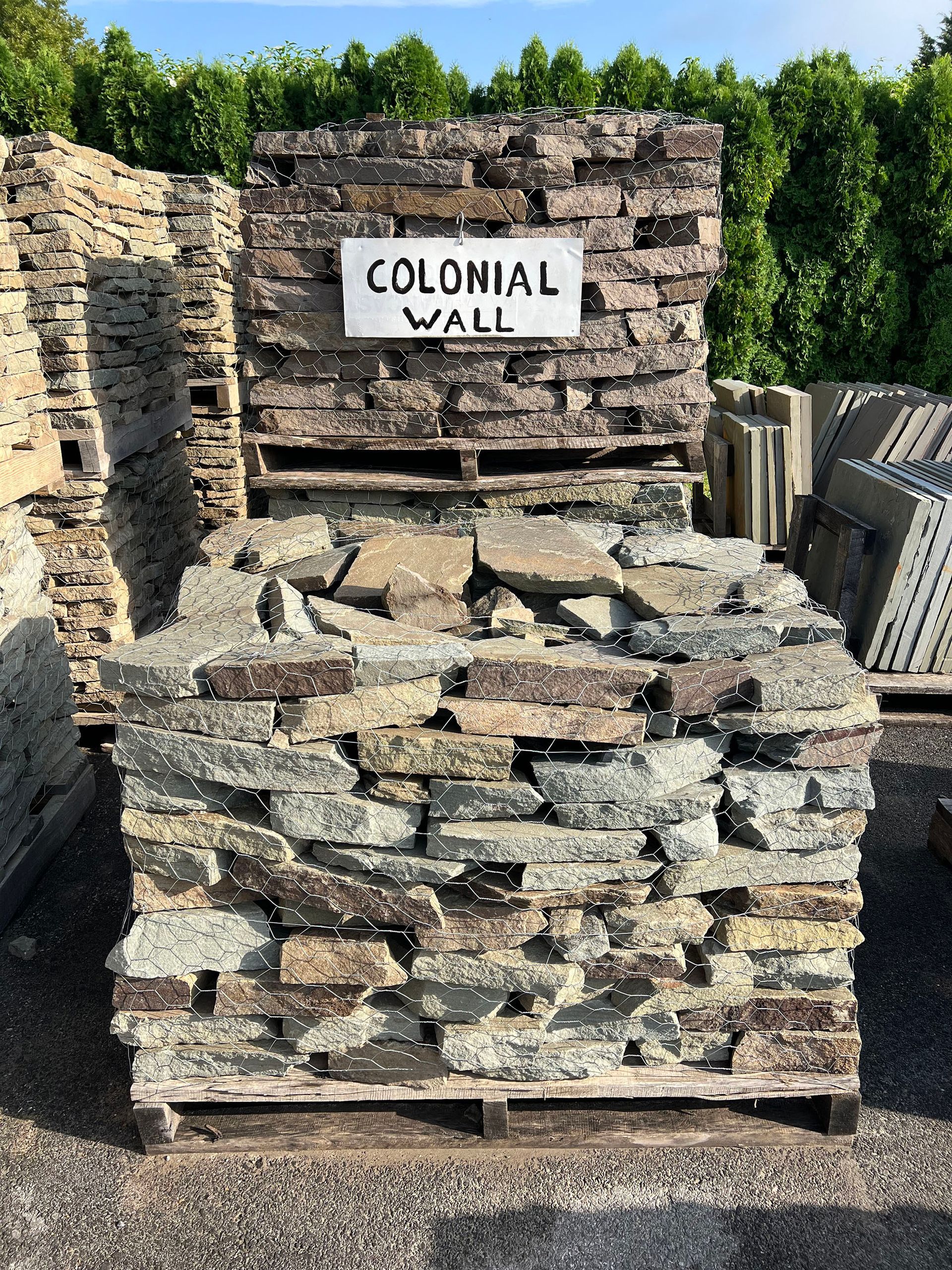 A pile of colonial wall stone on a wooden pallet