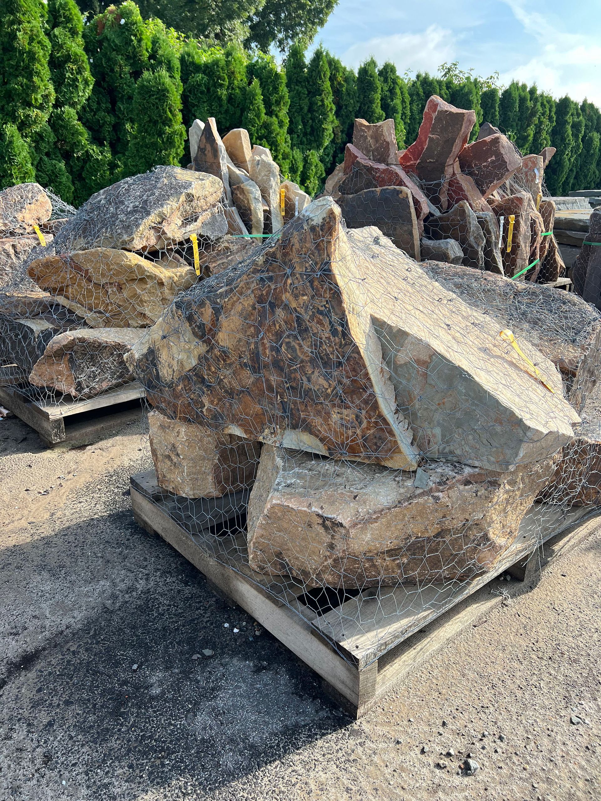 A pile of rocks sitting on top of a wooden pallet.