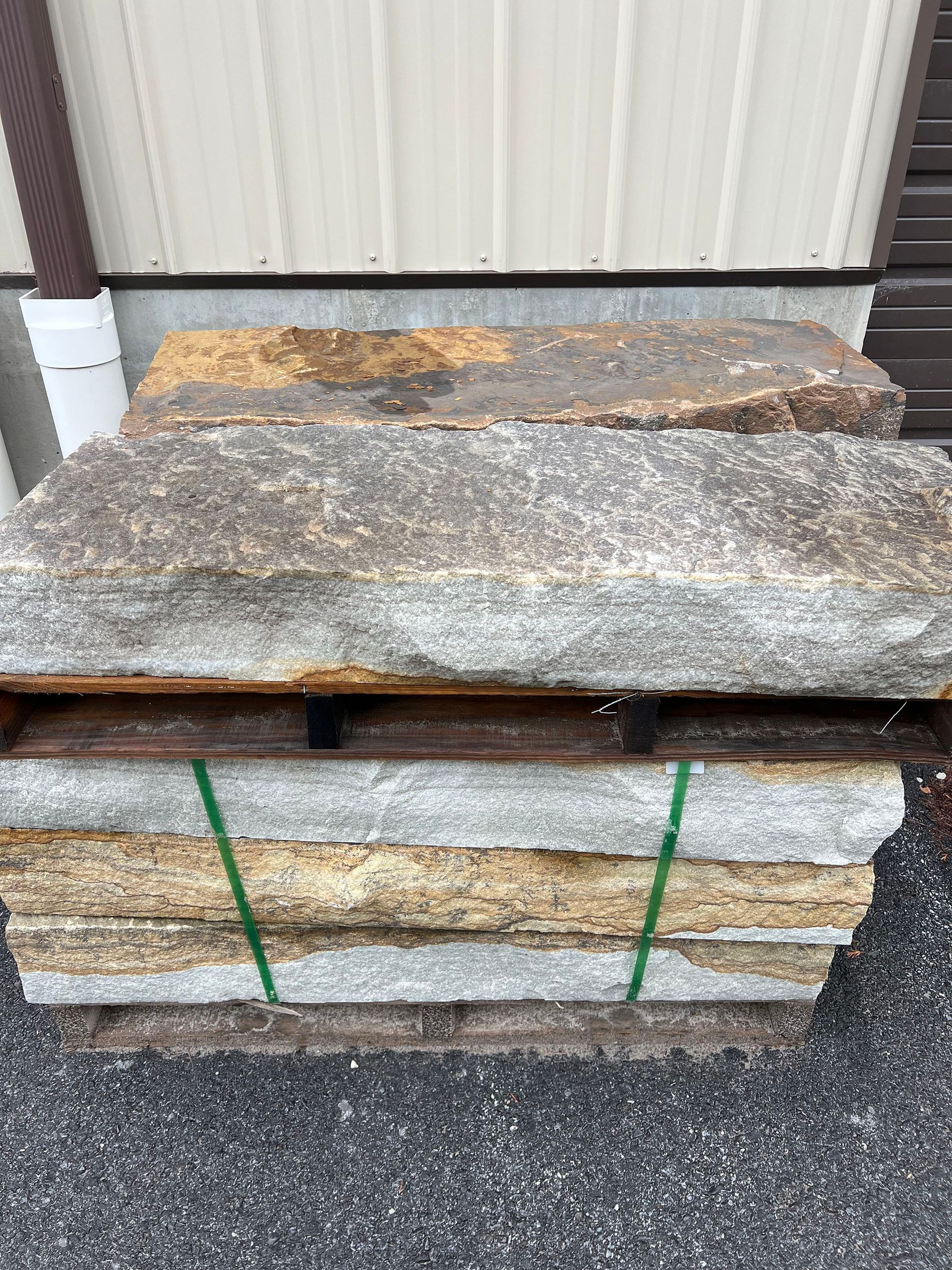 A pile of rocks sitting on top of a wooden pallet.