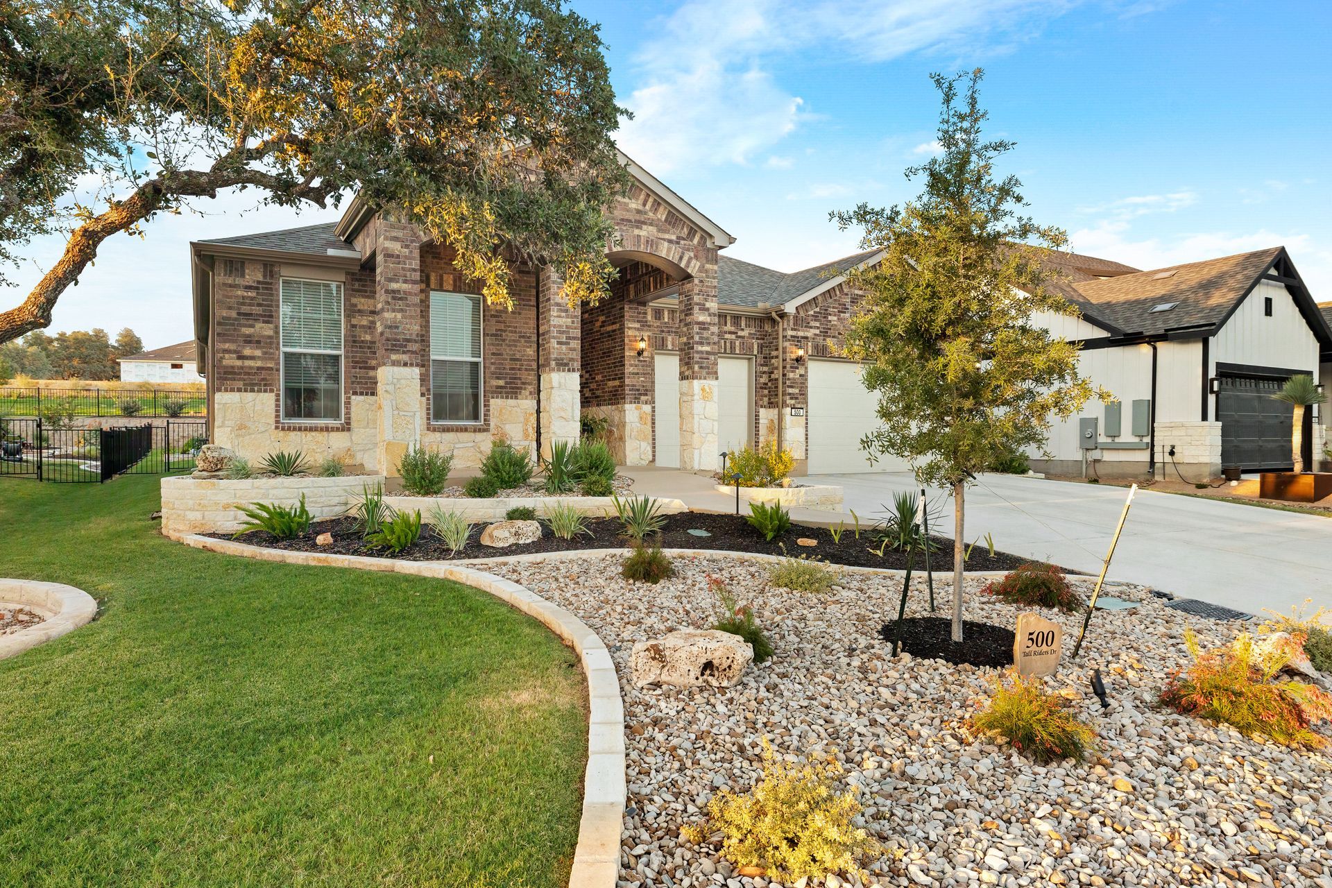 A house with a lot of rocks in front of it.