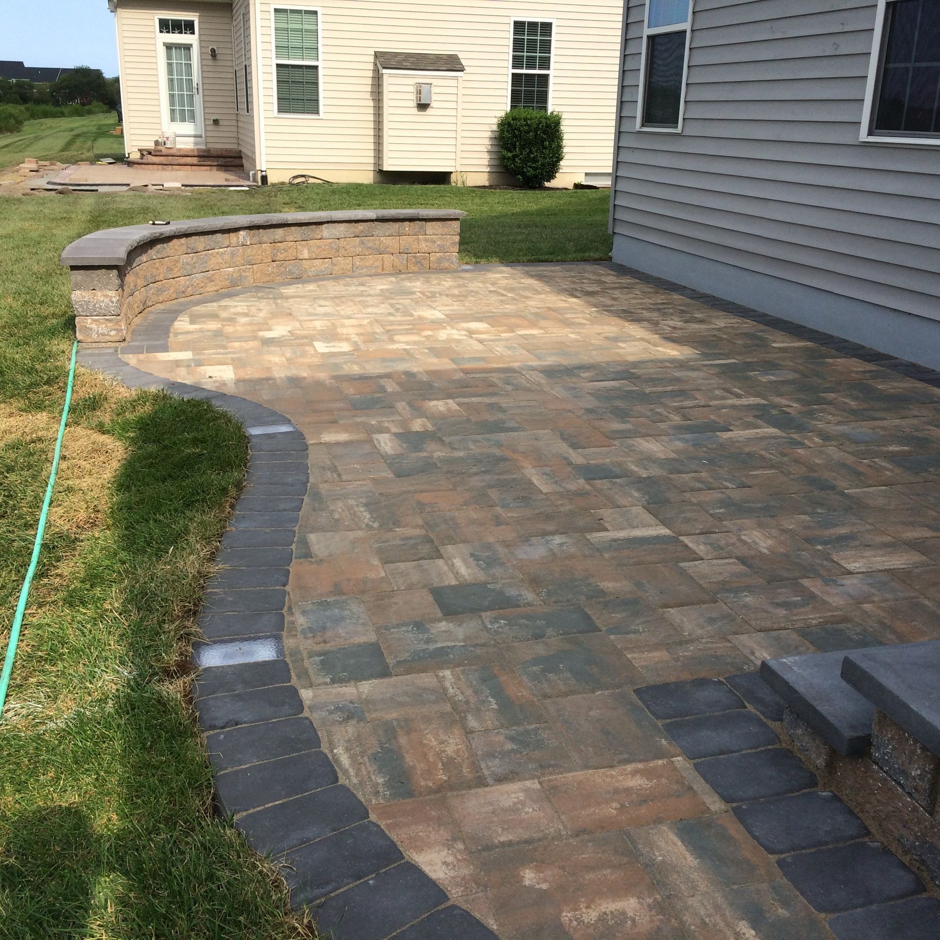 A house with a patio in front of it