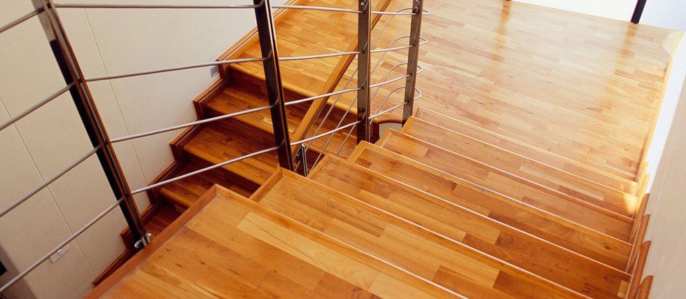 Stairs with a hardwood floor