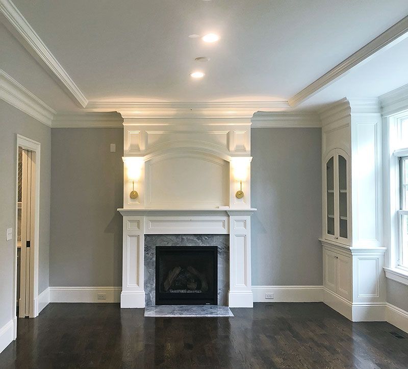 There is a fireplace in the middle of the room.