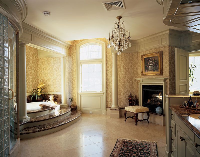 A bathroom with a fireplace and a bathtub