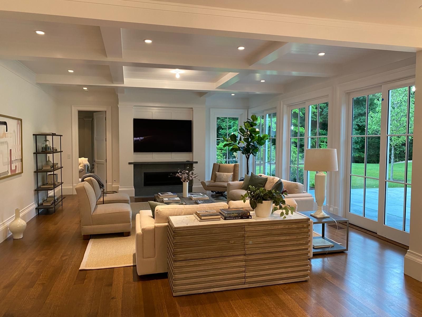 A living room filled with furniture and a flat screen tv.