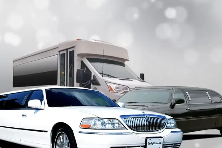 A white limo, a black limo, and a white passenger van against a blurred background.
