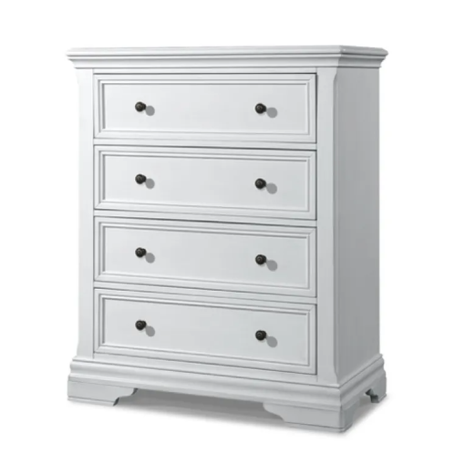 White four-drawer chest with black knobs, simple molding, and a decorative base.