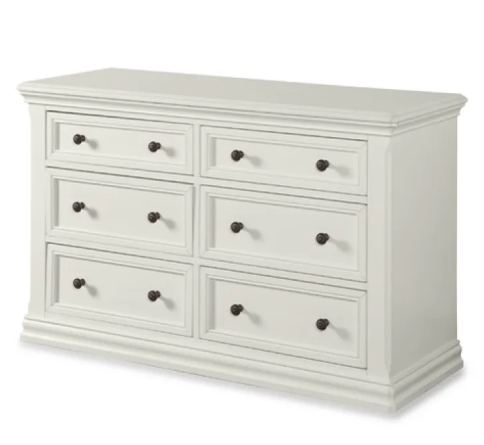 White six-drawer dresser with dark knobs.