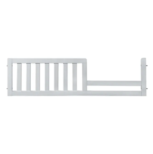 White toddler bed rail with vertical slats.