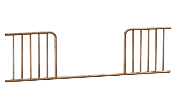 Brown metal toddler bed rail.