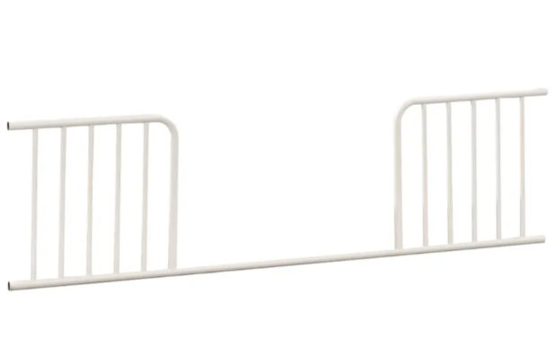 White metal toddler bed rail.