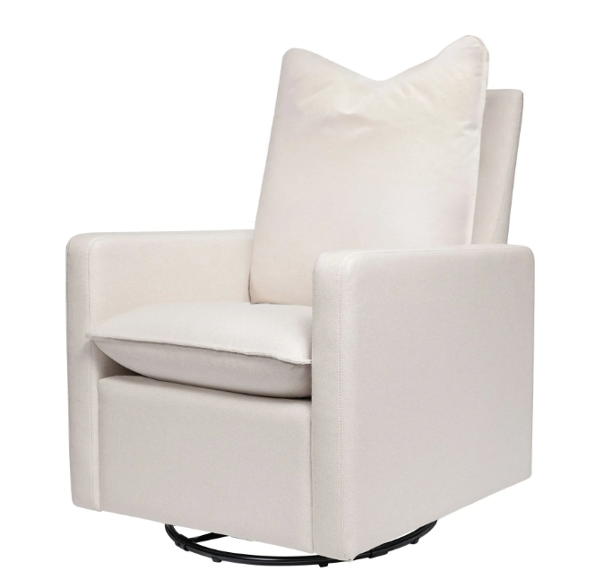 White upholstered swivel armchair with a pillow.