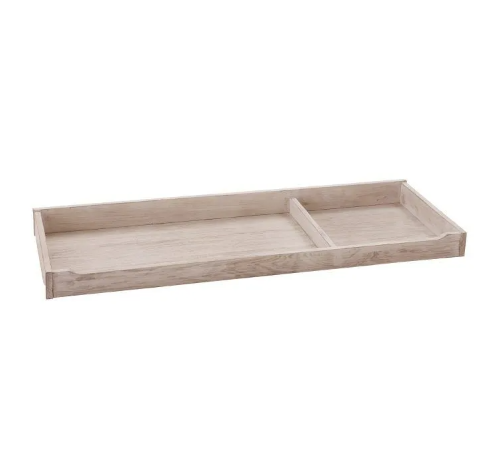 Light wood-toned changing table topper with a divider creating two compartments.