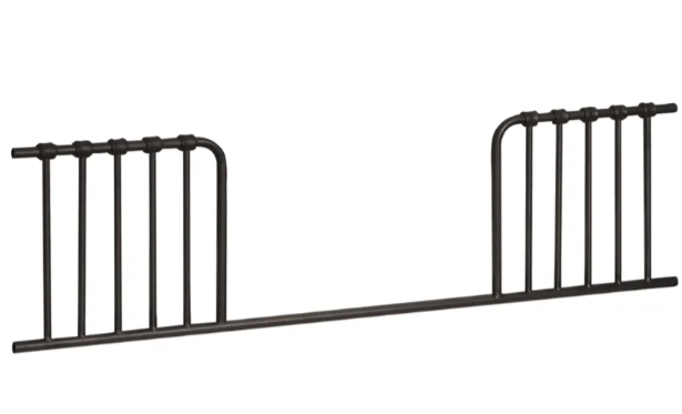 Black metal toddler bed rail.