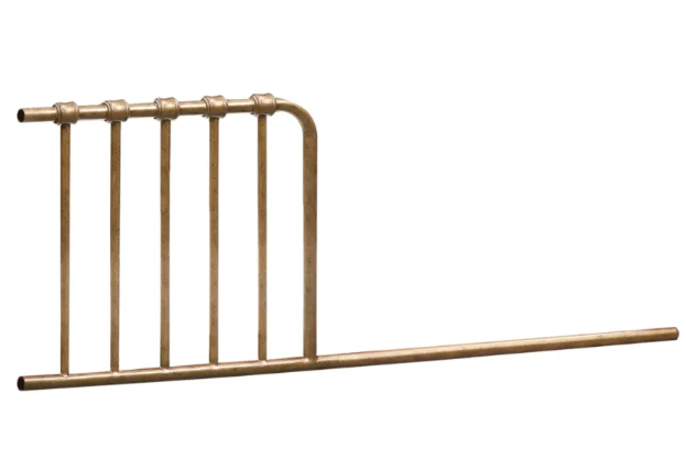 Copper pipe manifold with six vertical outlets.