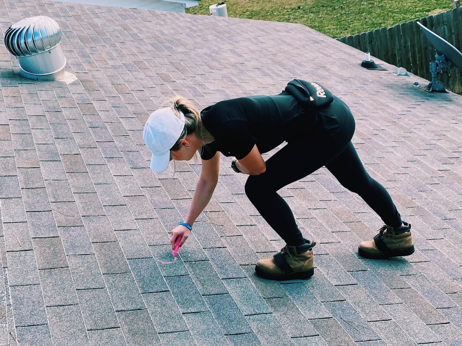 lady marking the roof