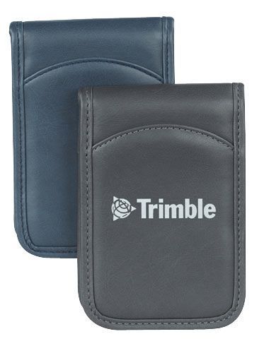 Two wallets with trimble written on them are sitting next to each other on a white background.