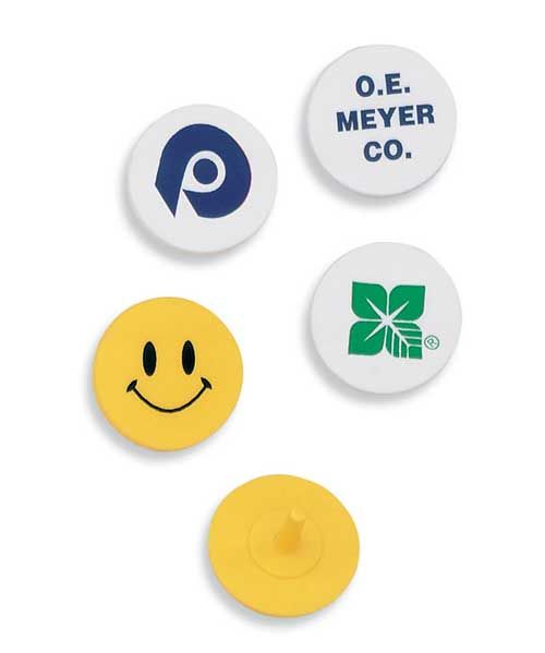 A group of buttons with one that says o.e. meyer co.