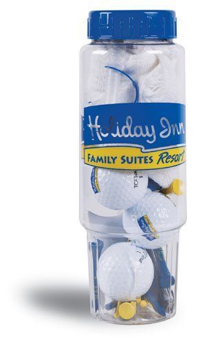 A clear bottle with a blue label that says holiday inn family suites resort