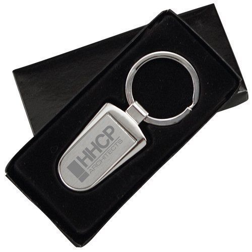 A hhcp keychain is in a black box