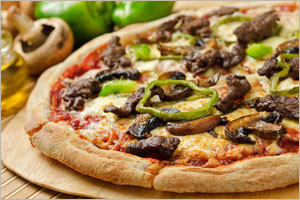 Pizza with mushroom and bell pepper toppings