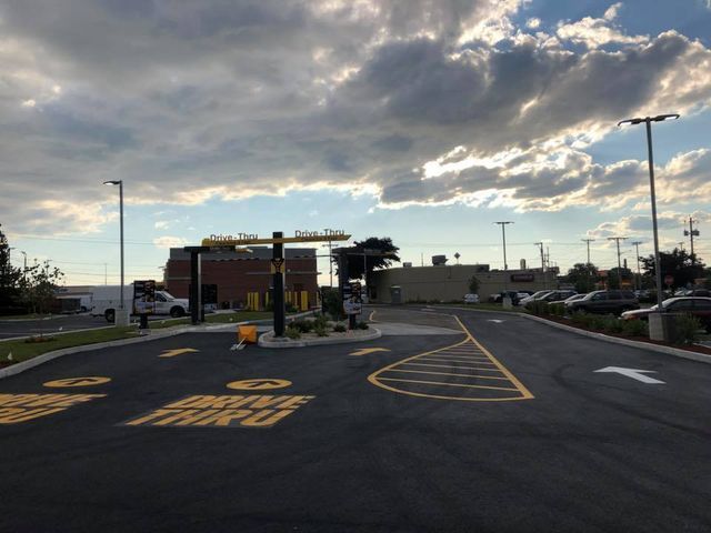 A parking lot with the words drive thru written on it