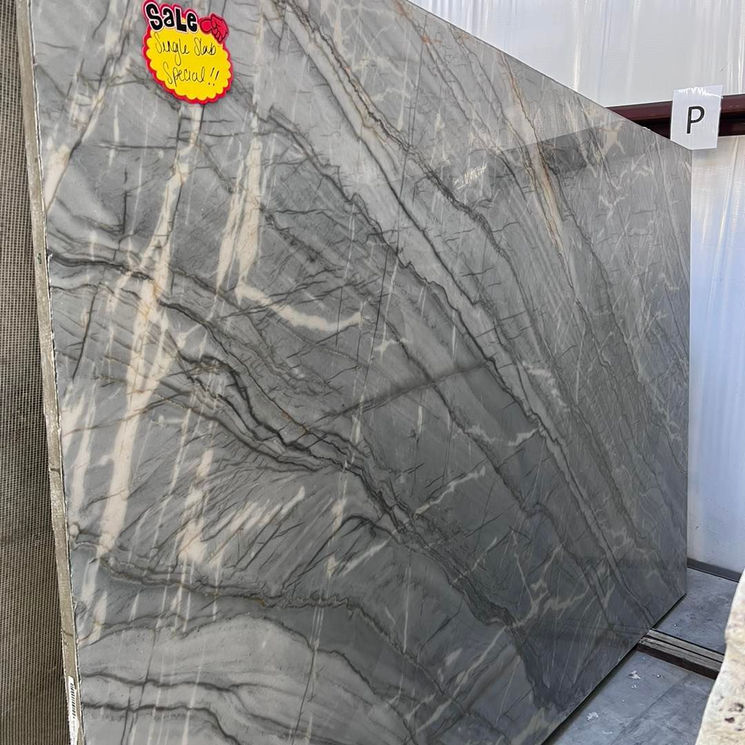 A gray marble slab with a price tag on it