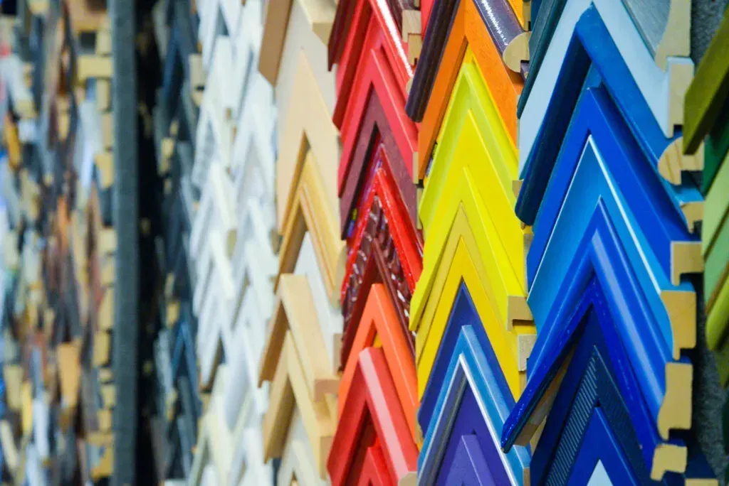 Colorful picture frames displayed, various shades of red, orange, yellow, blue, and more.