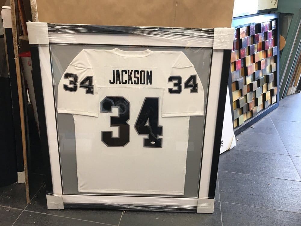 Framed football jersey, number 34, 