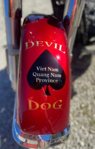 Red glass with “DEVIL” and “DOG” text, labeled “Viet Nam Quang Nam Province”