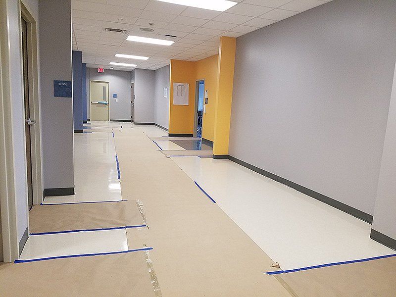 floor installation on a long hallway