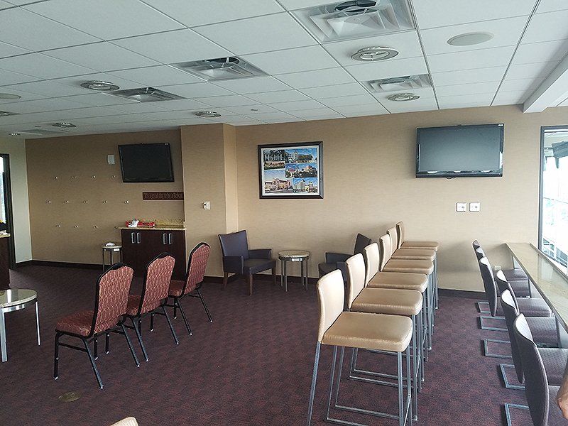 A large room with a lot of chairs and tables