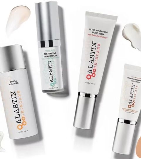 Four QALASTIN skincare tubes and bottles on a white background with beige cream swatches