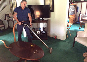 Cleaning the carpet using a vacuum cleaner