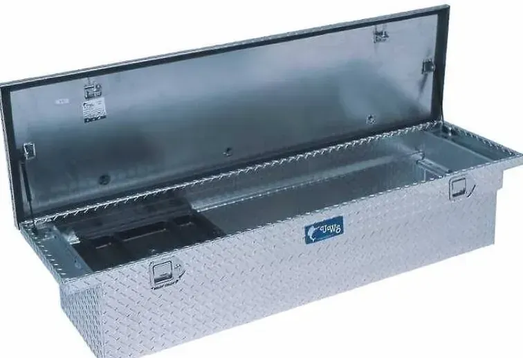 Open silver diamond plate truck bed toolbox.