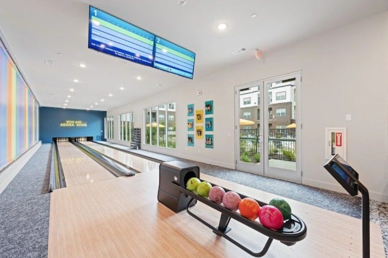 There is a bowling alley in the middle of the room.