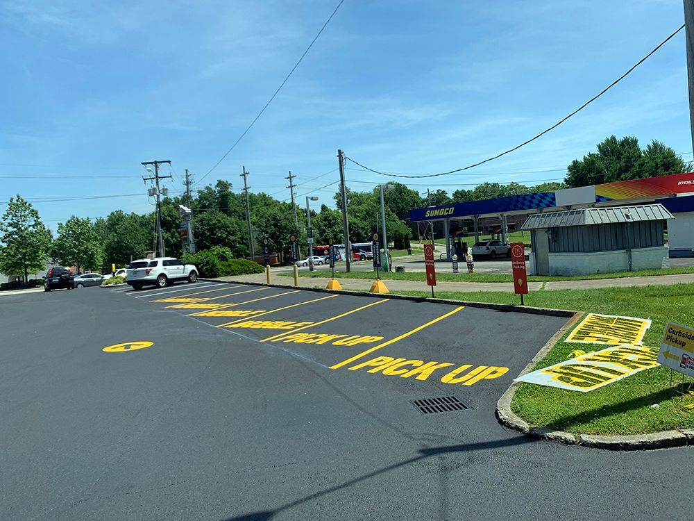 A parking lot with a sign that says pickup on it