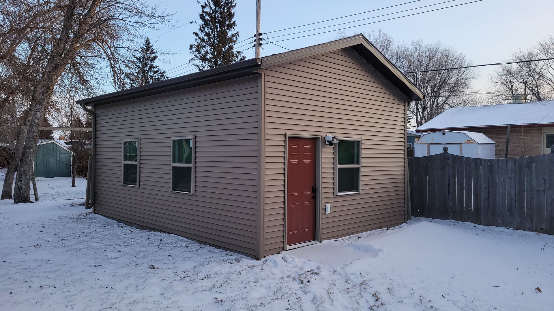 Garage with a red door
