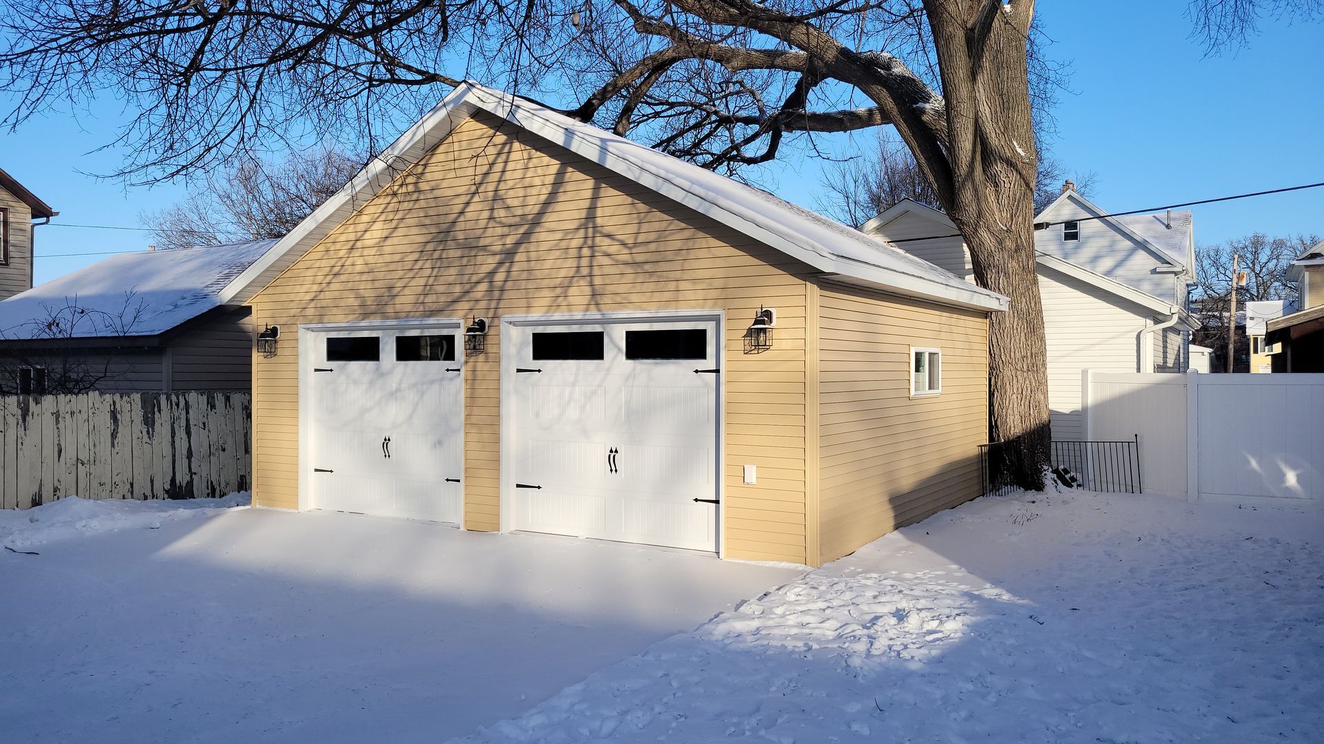 Garage with white garage doors